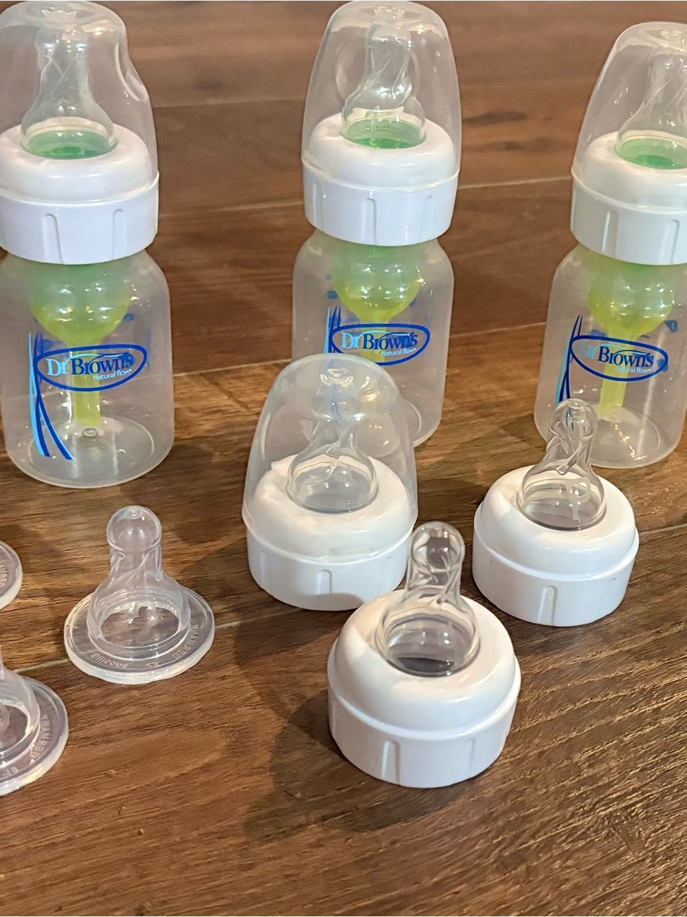 White & Green Baby Bottles